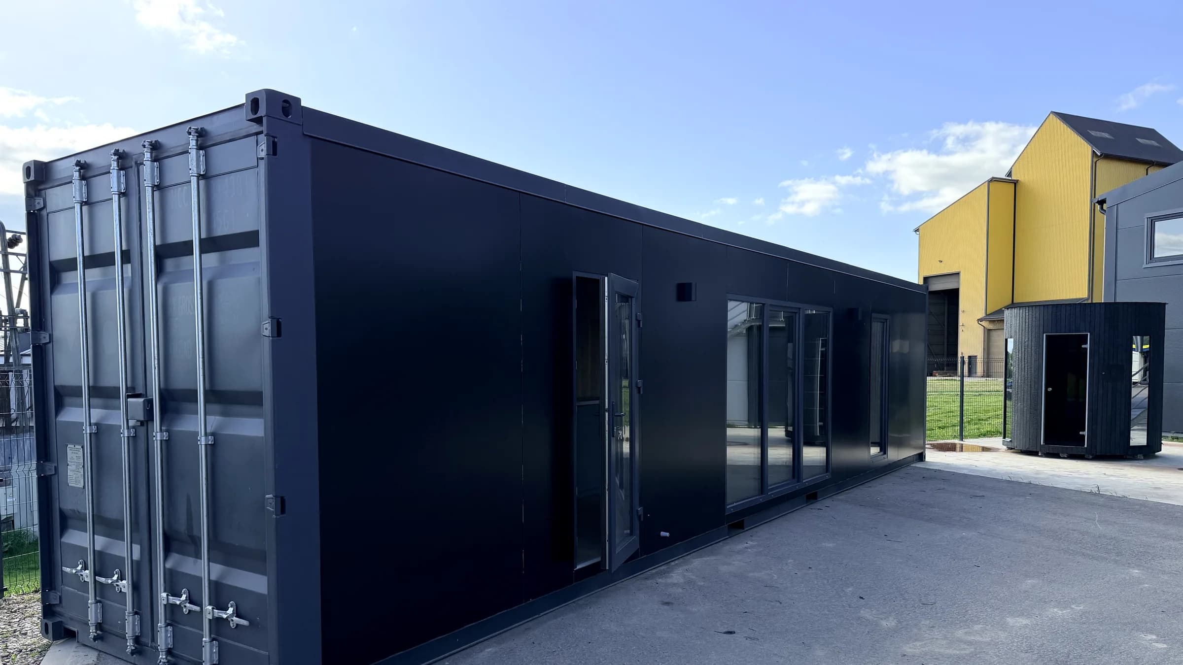 MARA MODULE HOME compact modular living space with kitchen and panoramic glazing
